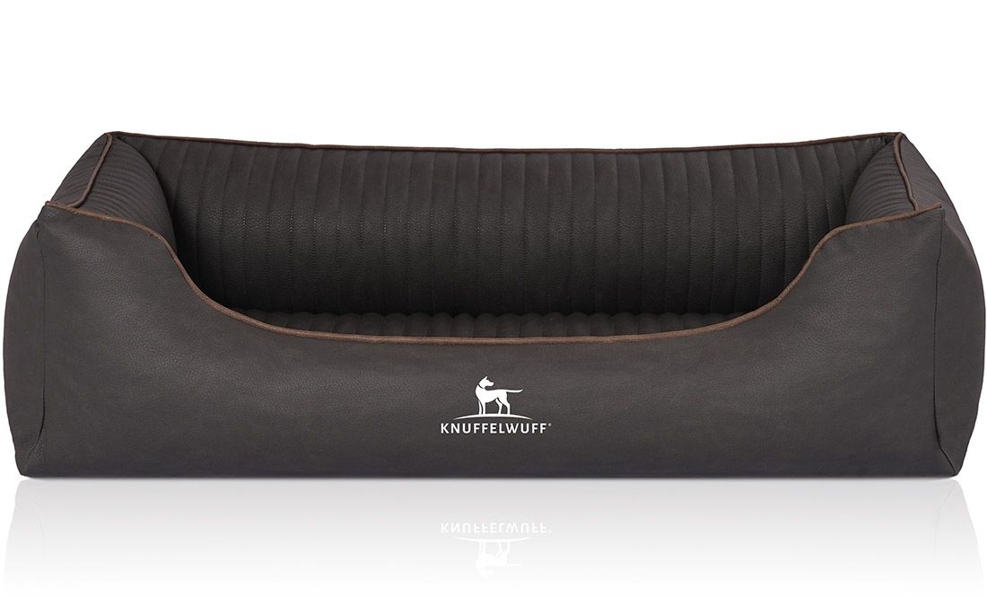 Orthopädisches Hundebett Columbia, dunkelgrau, mit braunen Ziernähten. Logo Knuffelwuff. Rechteckige Form mit erhöhten Seiten.