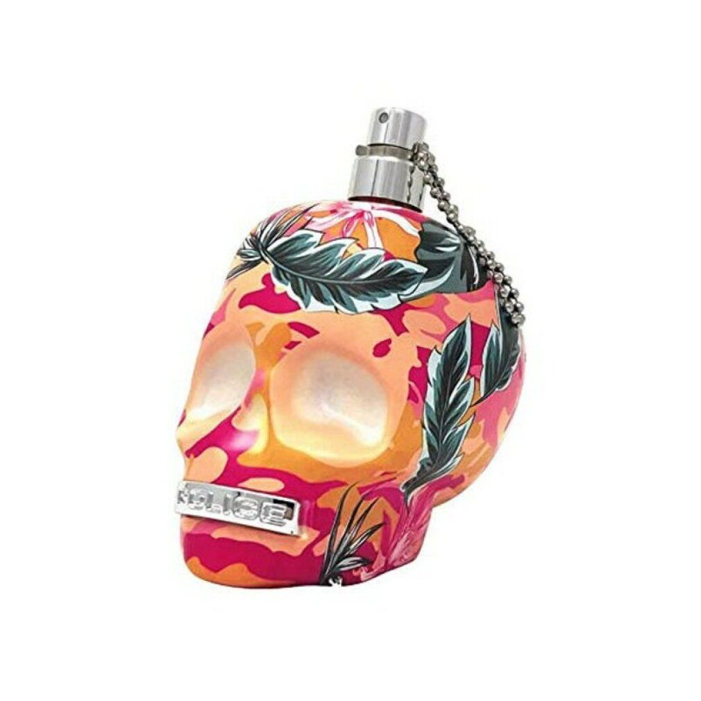 Parfümflakon in Totenkopfform mit tropischem Muster in Pink-, Orange- und Grüntönen.