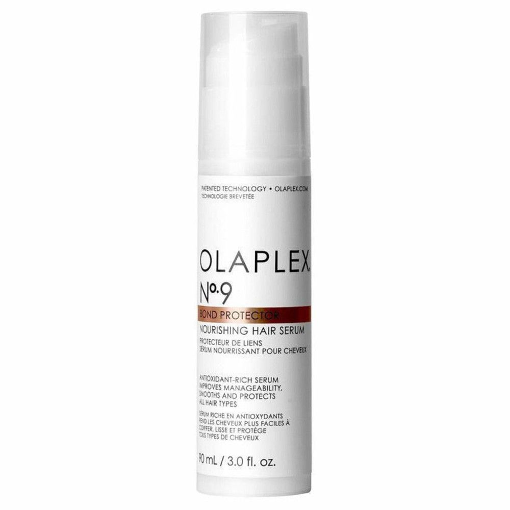 Weißer Olaplex No.9 Bond Protector Flakon mit Pumpe. Aufschrift: Nourishing Hair Serum. Brauner Streifen mit Produktnamen.