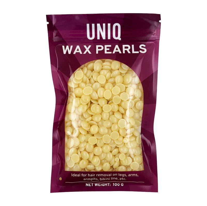 Beutel mit UNIQ Wax Pearls. Gelbliche Wachsperlen. Aufschrift: Ideal für Haarentfernung an Beinen, Armen, Achseln, Bikinizone usw.
