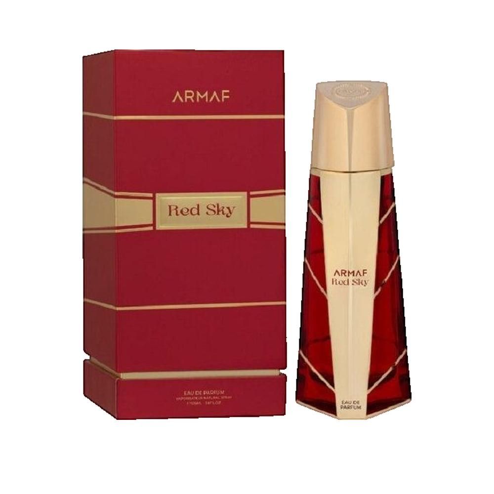 Roter Flakon und Verpackung von Armaf Red Sky Eau de Parfum Dames. Goldfarbene Akzente. Flakon mit goldener Kappe.