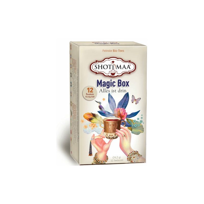 Karton "Magic Box" mit floralem Design und Händen, die eine Tasse halten. Aufschrift: "SHOTI MAA", "12 Sorten".