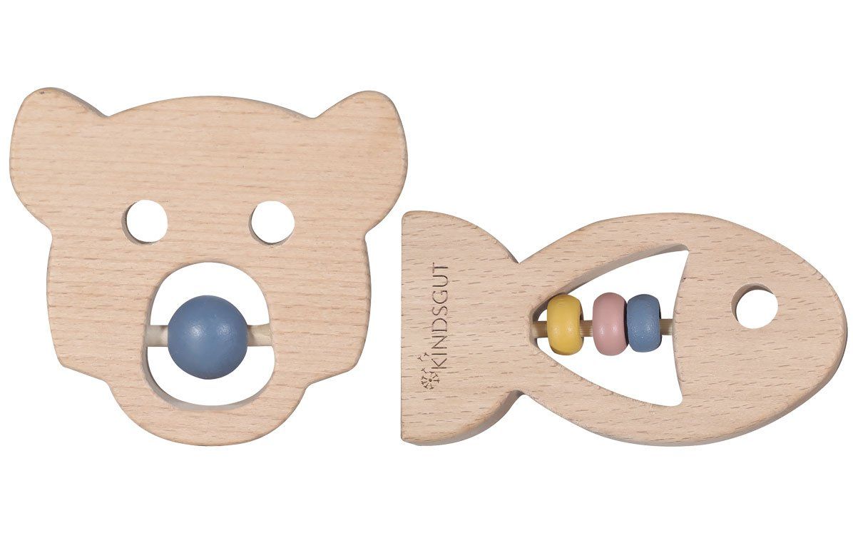 Zwei Holz-Beißringe. Einer in Bärenform mit blauer Kugel, einer in Fischform mit bunten Perlen. Marke Kindsgut.
