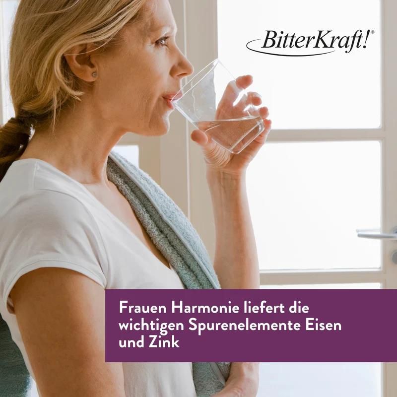 Frau trinkt Wasser. Text: Frauen Harmonie liefert Spurenelemente Eisen und Zink. BitterKraft! Logo.