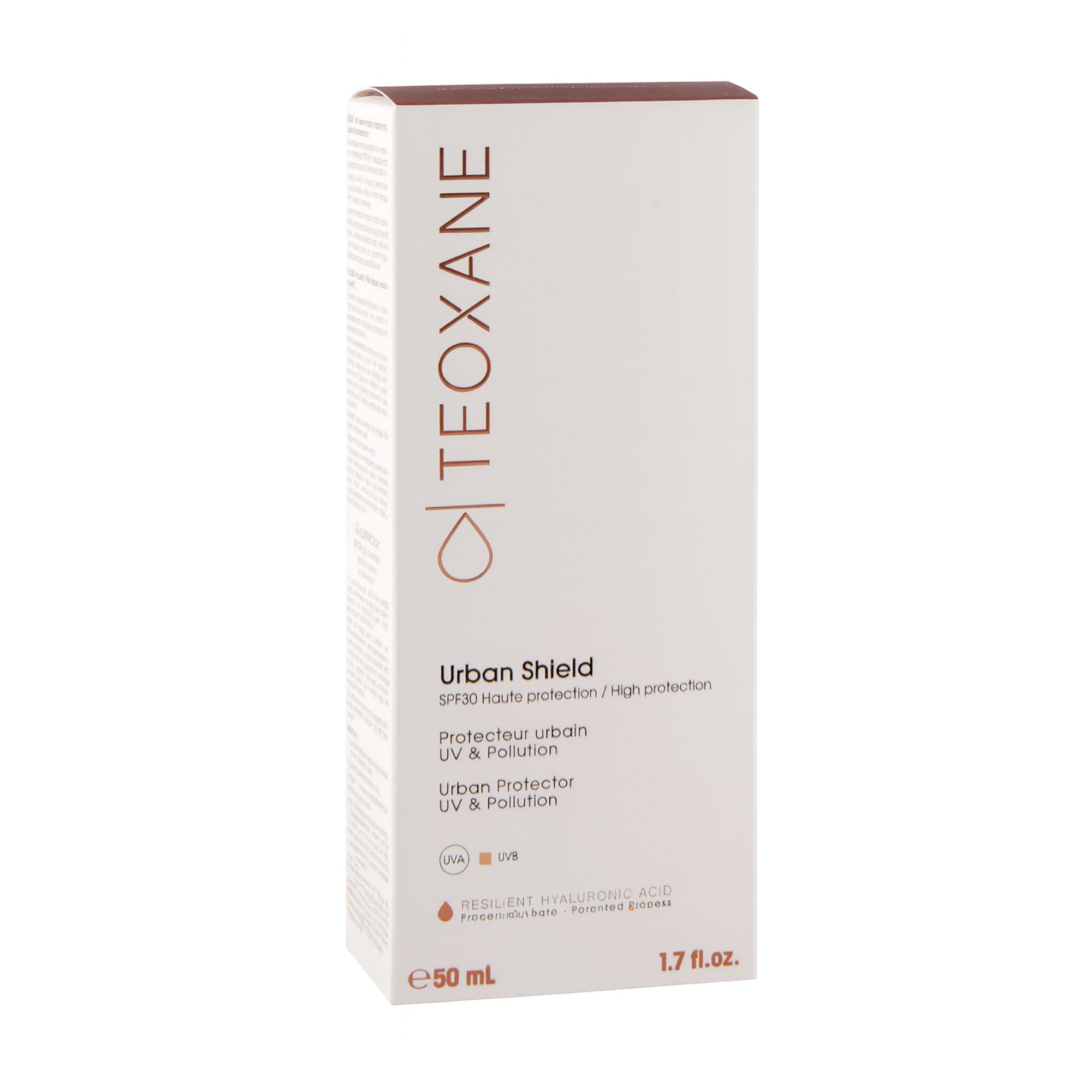 Verpackung von TEOXANE Urban Shield LSF 30+. Weißer Karton mit braunen Akzenten. Produktname und Details sind aufgedruckt.