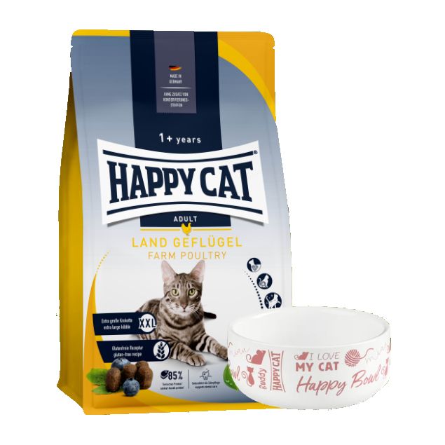 Verpackung von Happy Cat Adult Land Geflügel Katzenfutter und Futternapf. Aufschrift: Happy Cat, Land Geflügel, 1+ Jahre. Napf mit Aufschrift: I love my cat Happy Bowl.