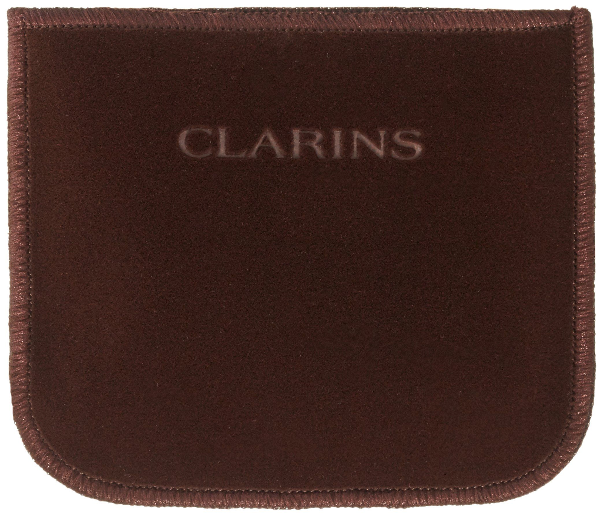 Braune Kosmetiktasche mit abgerundeten Ecken, Schriftzug CLARINS, genähte Kanten.