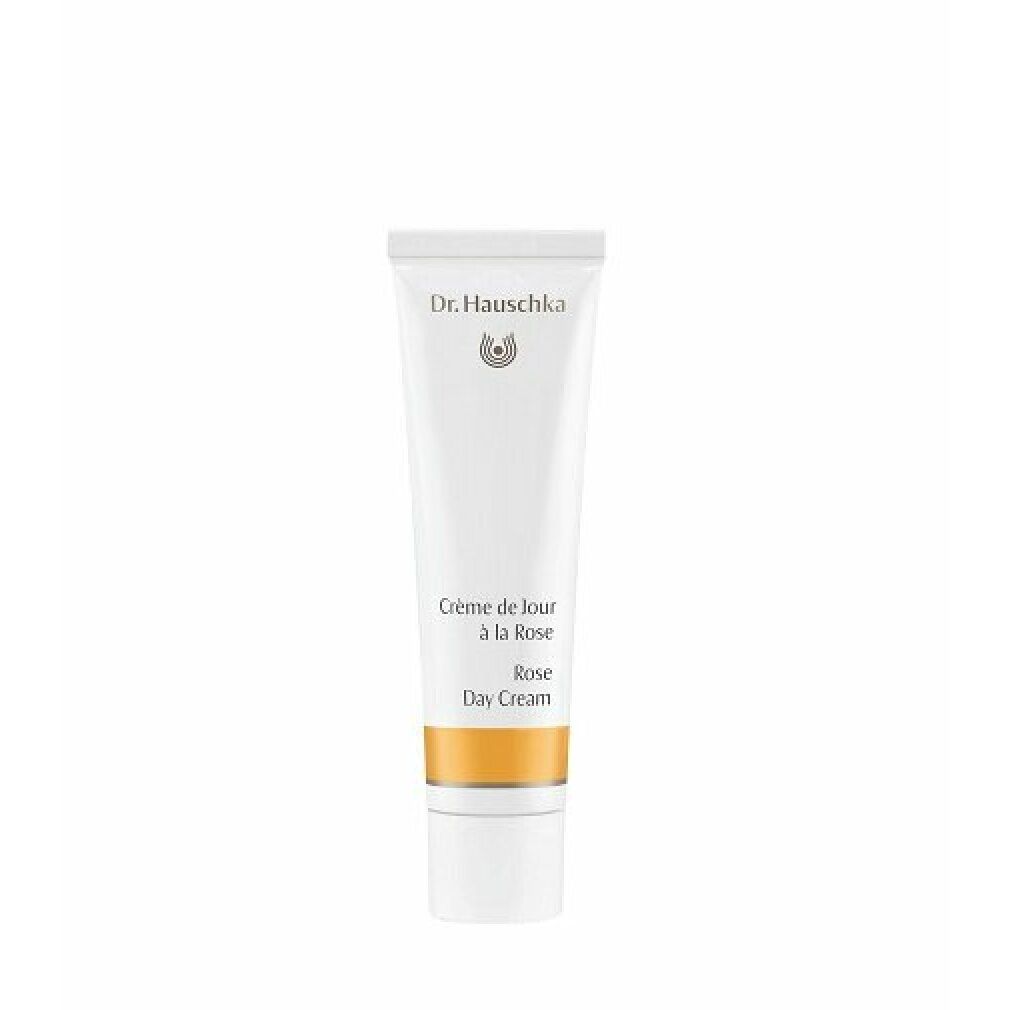 Weiße Tube mit gelbem Streifen. Beschriftung: Dr. Hauschka, Crème de jour à la Rose, Rose Day Cream.