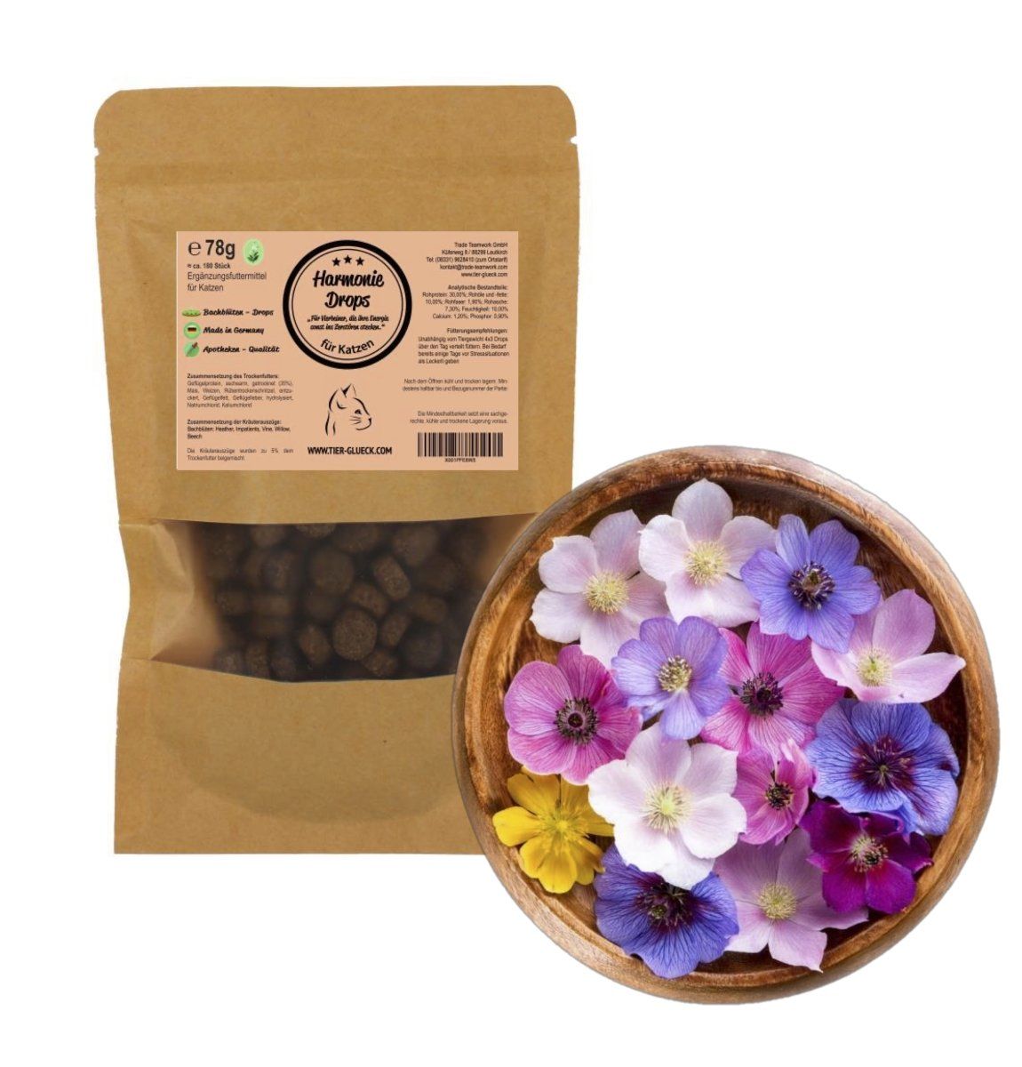Beutel mit Drops neben Holzschale mit bunten Blüten. Aufschrift: Harmonie Drops für Katzen. 78g, ca. 180 Stück.