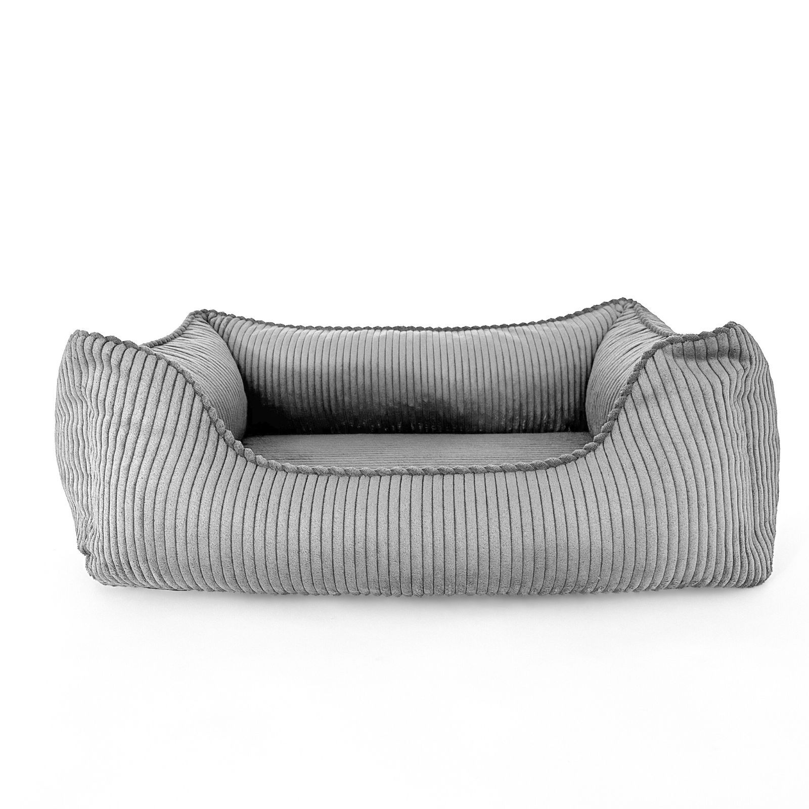 Graues Hundebett mit Cord-Optik. Rechteckige Form mit erhöhten Seiten. Gepolstert, mit sichtbaren Nähten.