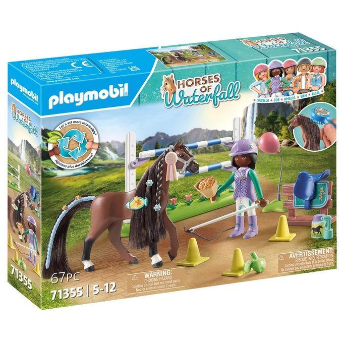 Set di gioco Playmobil 71355. La confezione mostra un cavallo marrone con accessori, una figura di cavaliere e ostacoli. Il set contiene 67 pezzi ed è adatto a bambini dai 5 ai 12 anni. Sono visibili il logo Playmobil e il titolo "Horses of Waterfall".
