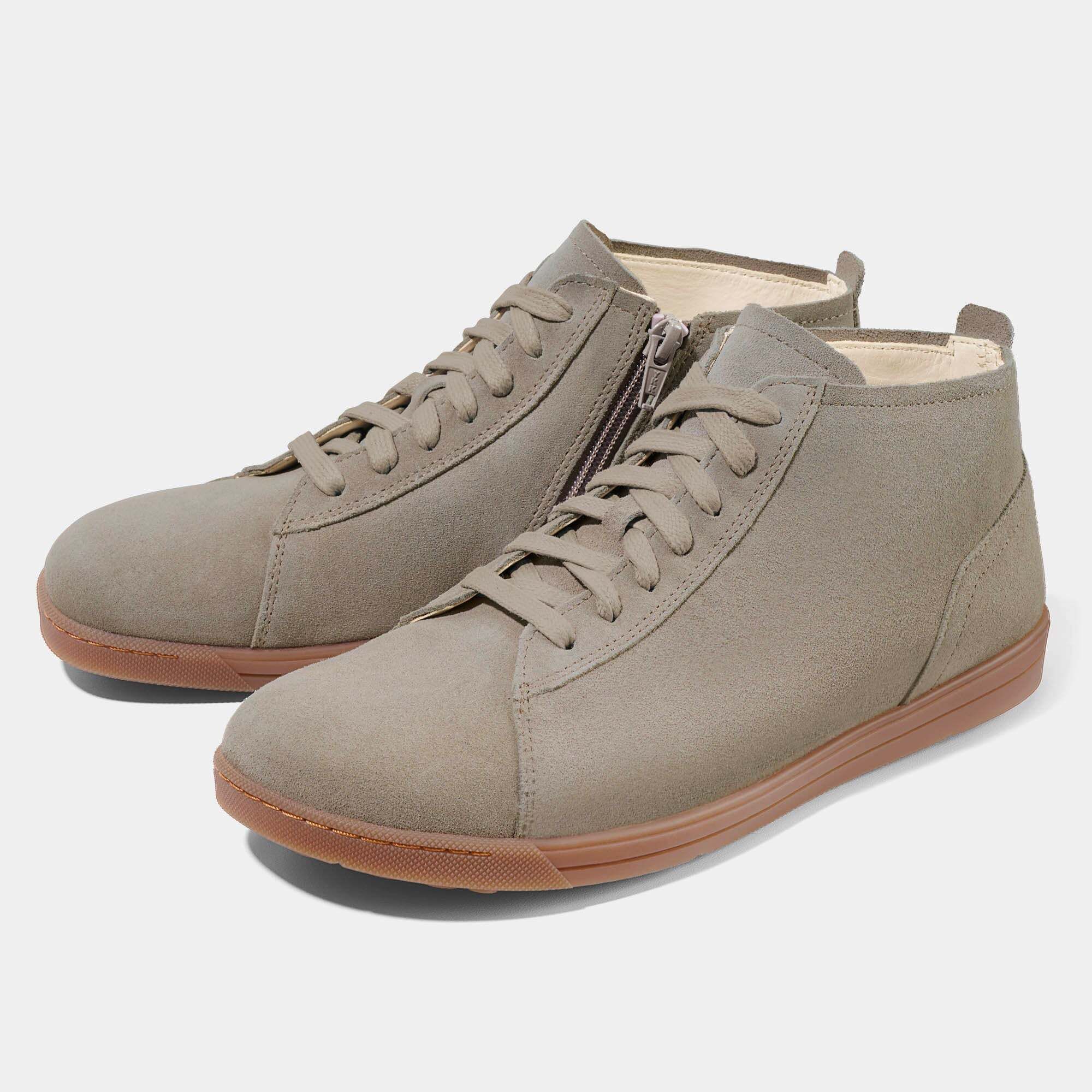 Graue Wildleder-Stiefeletten mit Schnürung und Reißverschluss.