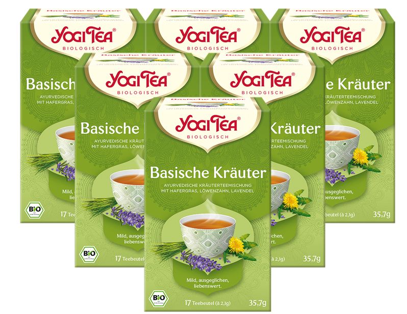 Mehrere grüne Yogi Tea-Verpackungen. Aufdruck: Basische Kräuter, ayurvedische Kräutermischung, Bio-Siegel. 17 Teebeutel.