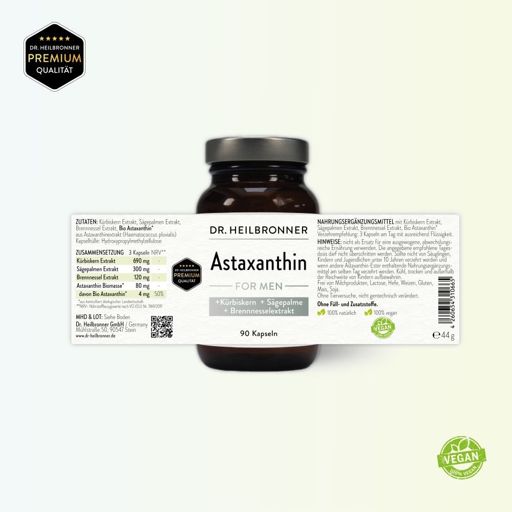 Flasche mit Etikett und Inhaltsangaben. Braune Kapseln daneben. Premium Qualität Siegel, Vegan-Siegel. Enthält Kürbiskern, Sägepalme, Brennnessel.
