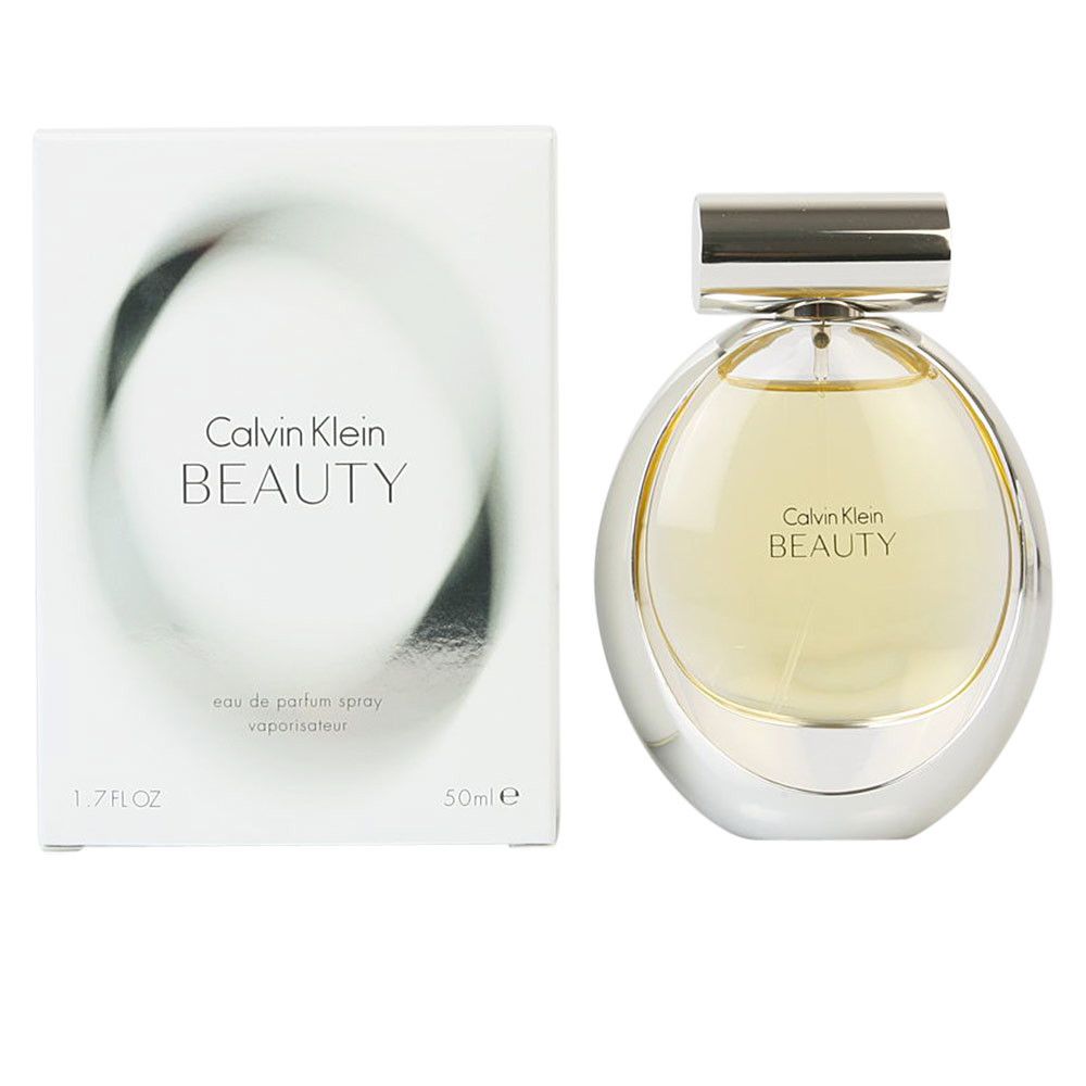 Parfumspray mit Verpackung. Flakon mit silbernem Verschluss und rundem Design. Aufschrift: Calvin Klein BEAUTY.