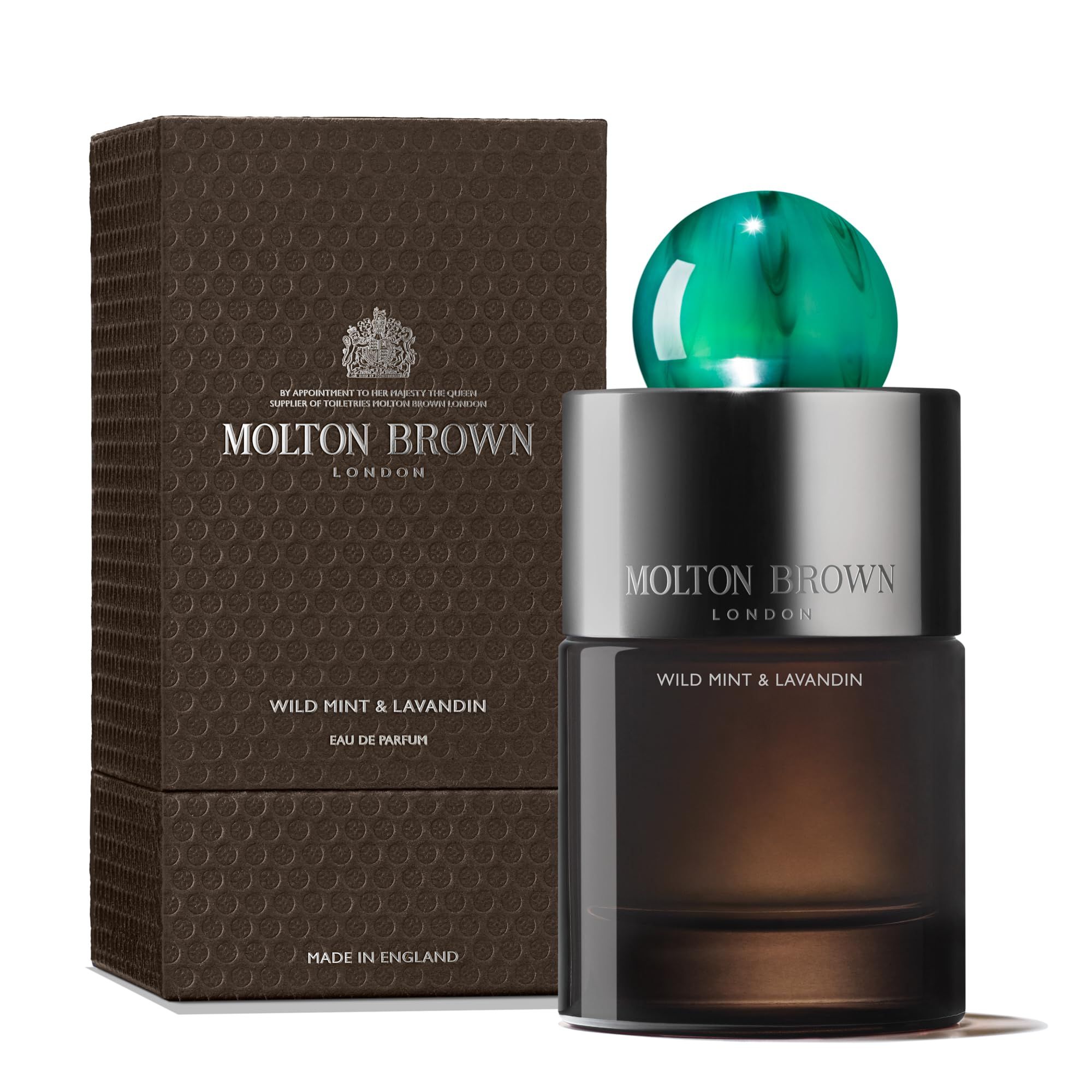 Molton Brown Wild Mint & Lavandin Flakon mit Verpackung. Braune Schachtel, Flakon mit grünem Verschluss. Text: Molton Brown.