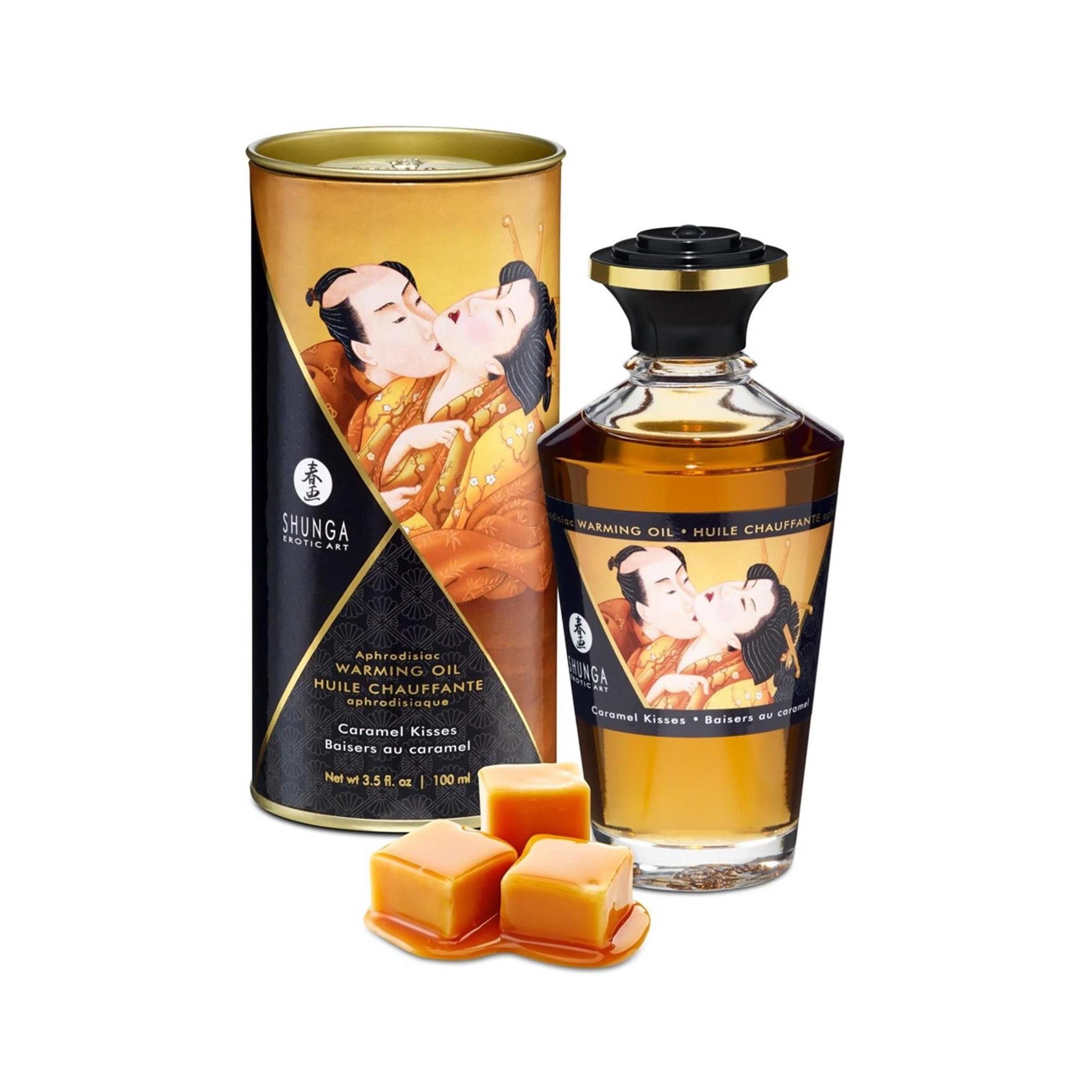 Zylindrische Dose und Flasche mit Öl. Dose mit Abbildung eines küssenden Paares. Flasche mit schwarzem Deckel und Etikett.