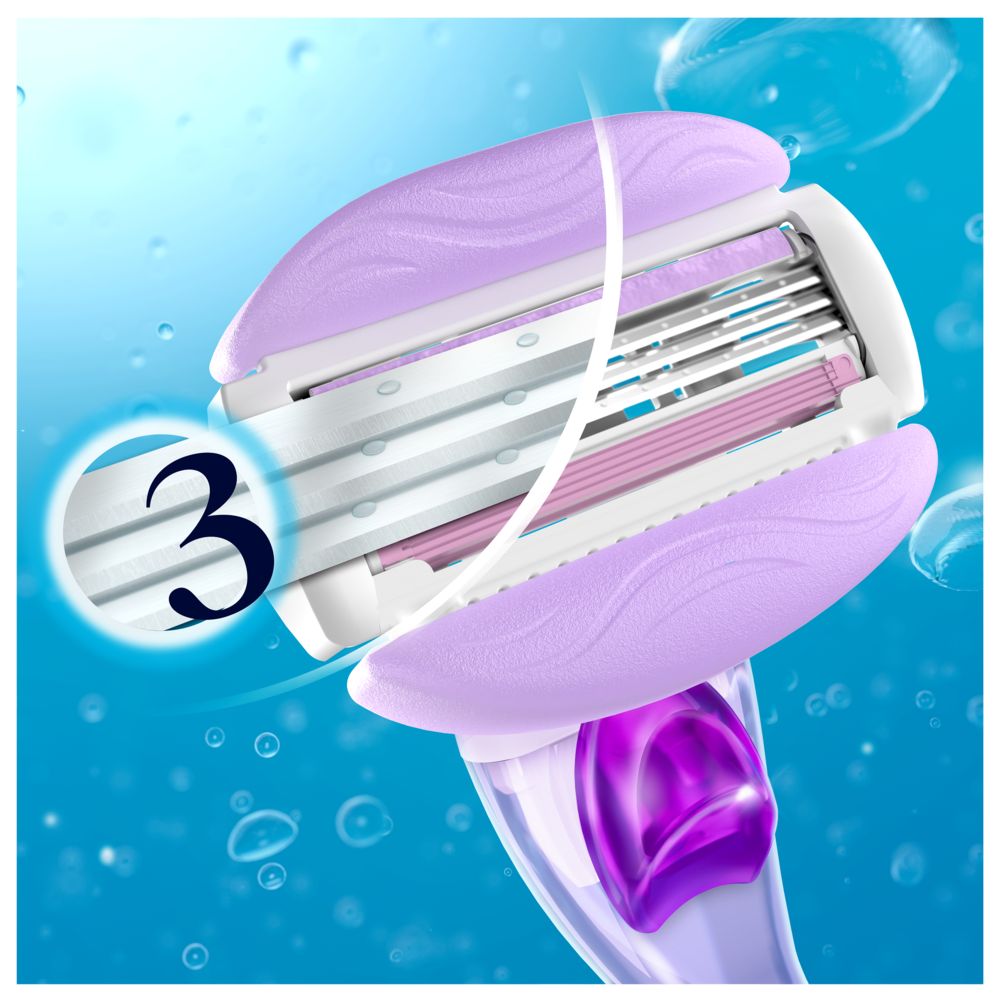 Nahaufnahme des Rasiererkopfes von Gillette Venus Comfortglide Breeze. 3 Klingen sichtbar.