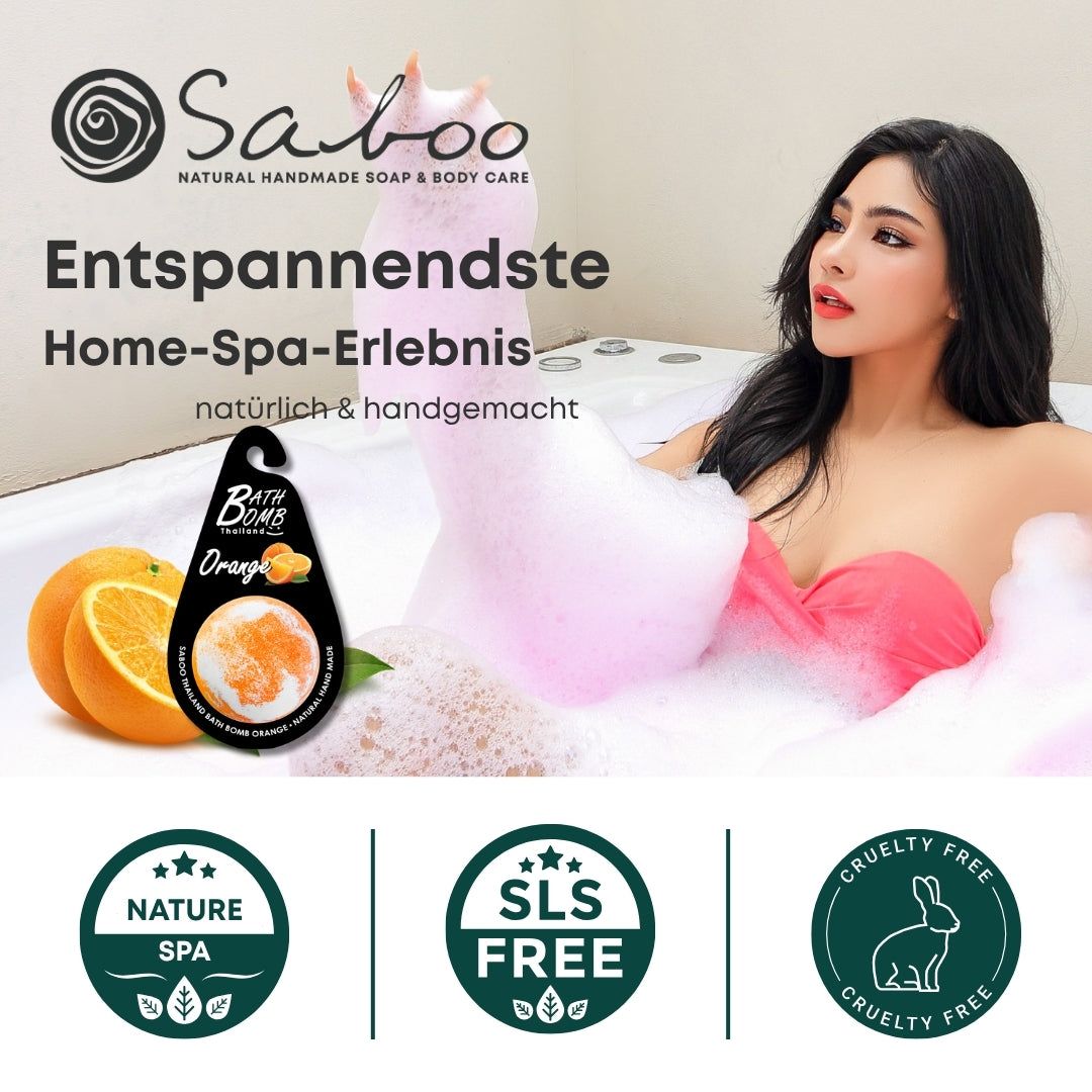 Frau in Badewanne mit Schaum. Neben ihr: Badewannenbombe Orange. Logos: Nature Spa, SLS Free, Cruelty Free.