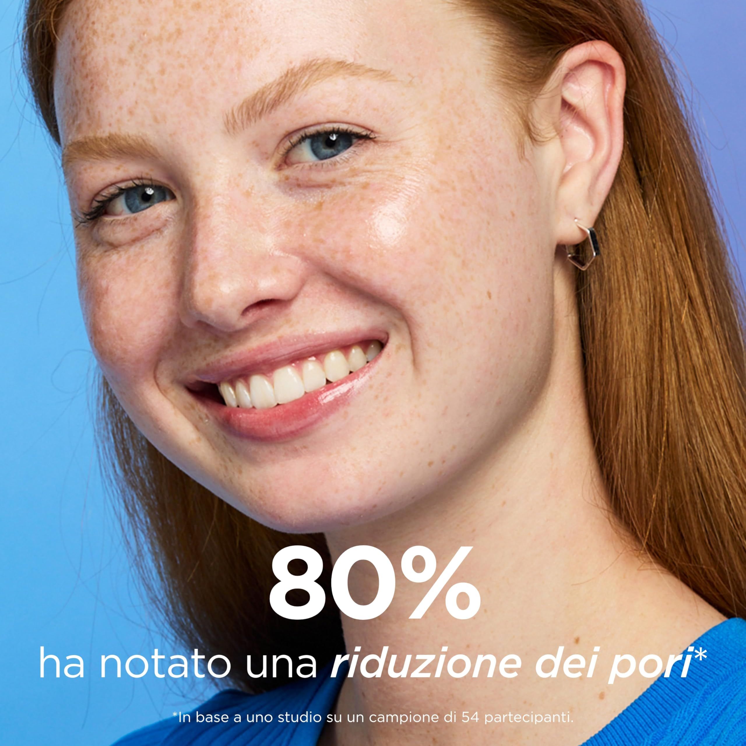 Nahaufnahme einer Frau mit Sommersprossen. Text: "80% haben eine Verringerung der Poren festgestellt".