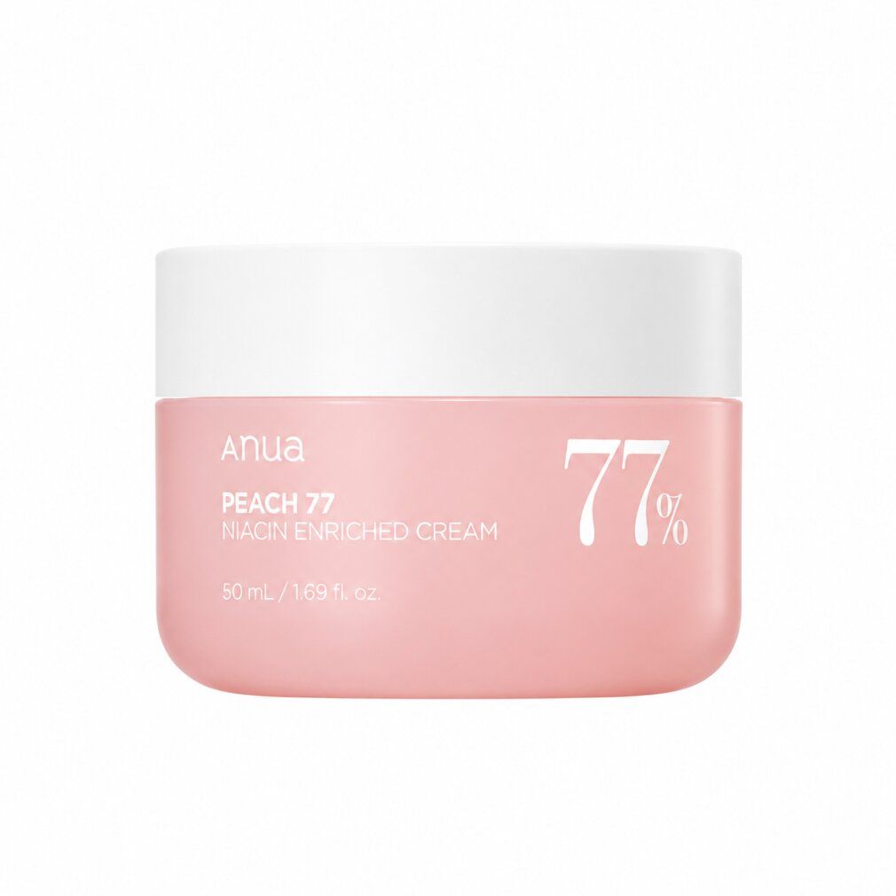 ANUA Peach 77% Niacin Enriched Cream in einem rosa Tiegel mit weißem Deckel, isoliert.