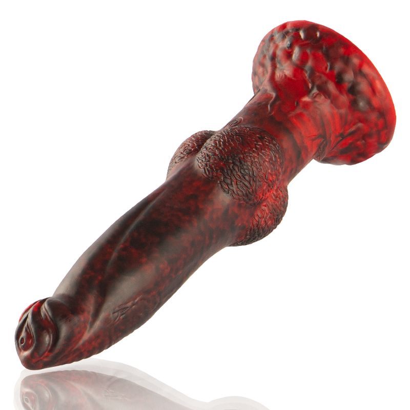 Roter und schwarzer Dildo mit strukturierten Oberflächen. Schräge Ansicht, auf weißem Hintergrund.