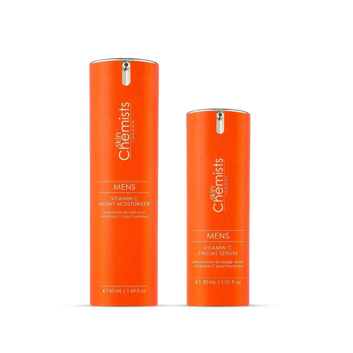 Zwei orangefarbene Pumpflaschen von SkinChemists für Männer: Vitamin C Nacht-Feuchtigkeitscreme und Vitamin C Gesichts-Serum.