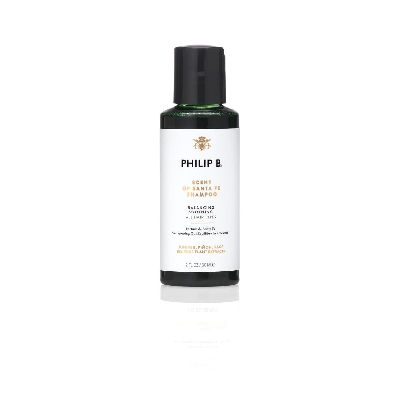 Kleine Flasche mit schwarzem Deckel. Auf dem Etikett steht PHILIP B. Scent of Santa Fe Shampoo. Text: Balancing Soothing, All Hair Types.