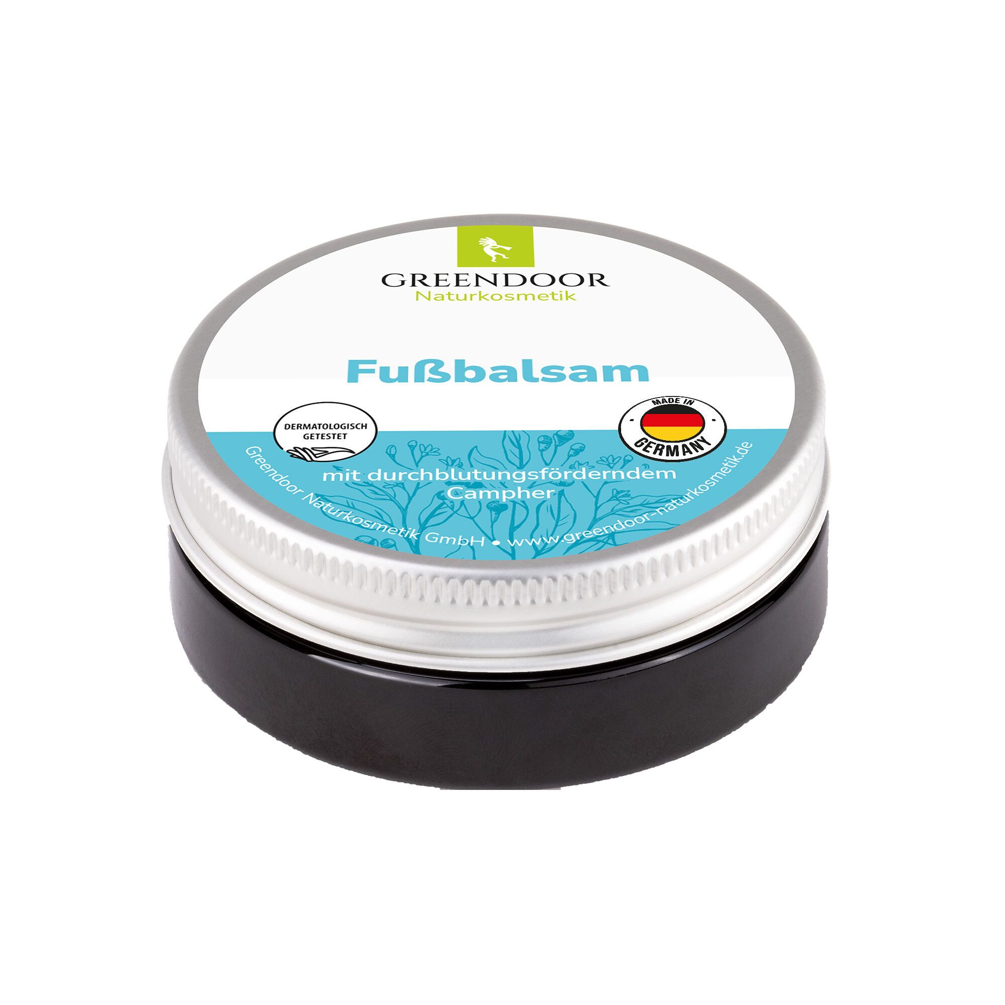 GREENDOOR Fußbalsam in schwarzer Dose mit silbernem Deckel. Enthält Campher und ist dermatologisch getestet.