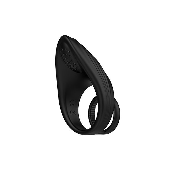 Schwarzer Vibrationsring mit geriffelter Oberfläche und einem kleinen Ring. Die Oberfläche ist mit Punkten versehen.