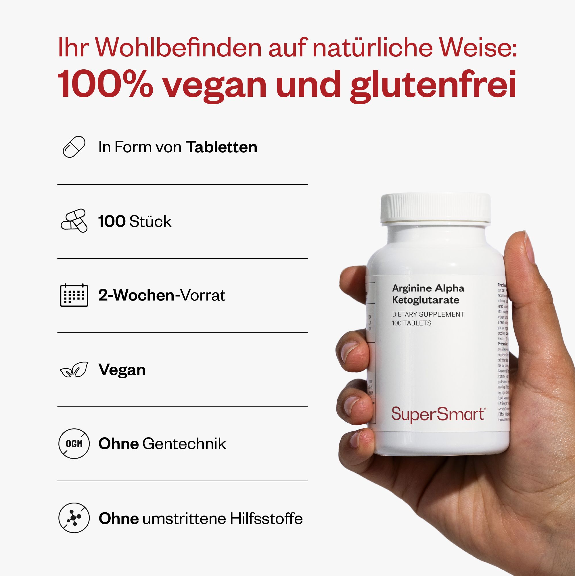 Person hält eine weiße Flasche mit Produkt. Text: Arginin Alpha Ketoglutarat, 100 Stück, SuperSmart. Aufschrift: Vegan, ohne Gentechnik.