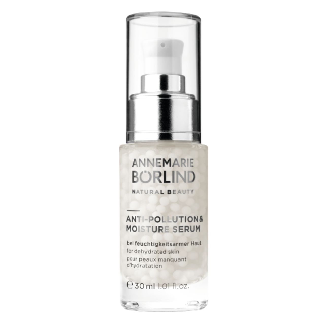 Serumflasche mit silbernem Pumpkopf. Text: ANNEMARIE BÖRLIND, ANTI-POLLUTION & MOISTURE SERUM. Für trockene Haut.