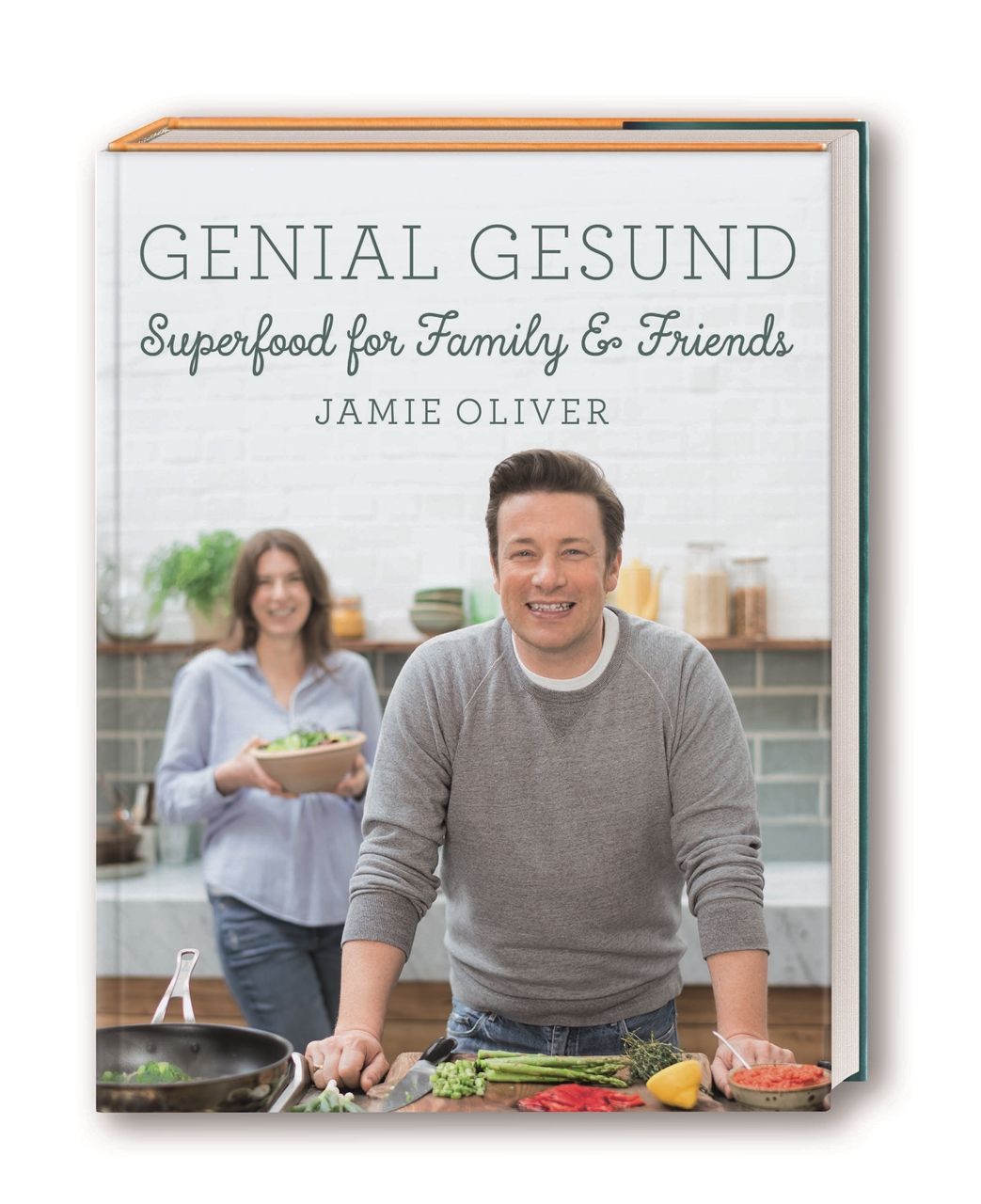 Buch "Genial Gesund" von Jamie Oliver. Cover mit Foto von Jamie Oliver und einer Frau. Titel und Untertitel.