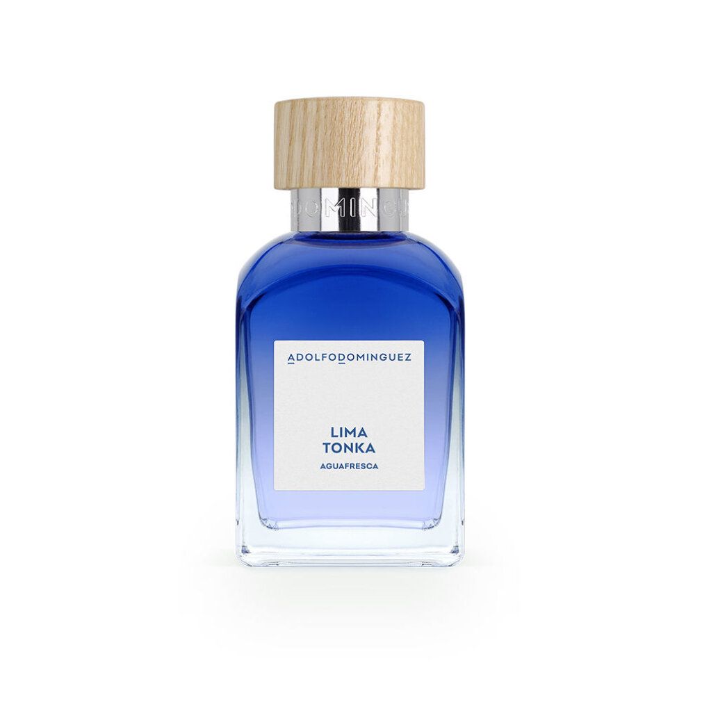 Blaues Parfümflakon mit Holzdeckel. Aufschrift: Lima Tonka Aquafresca. Marke: Adolfo Dominguez.