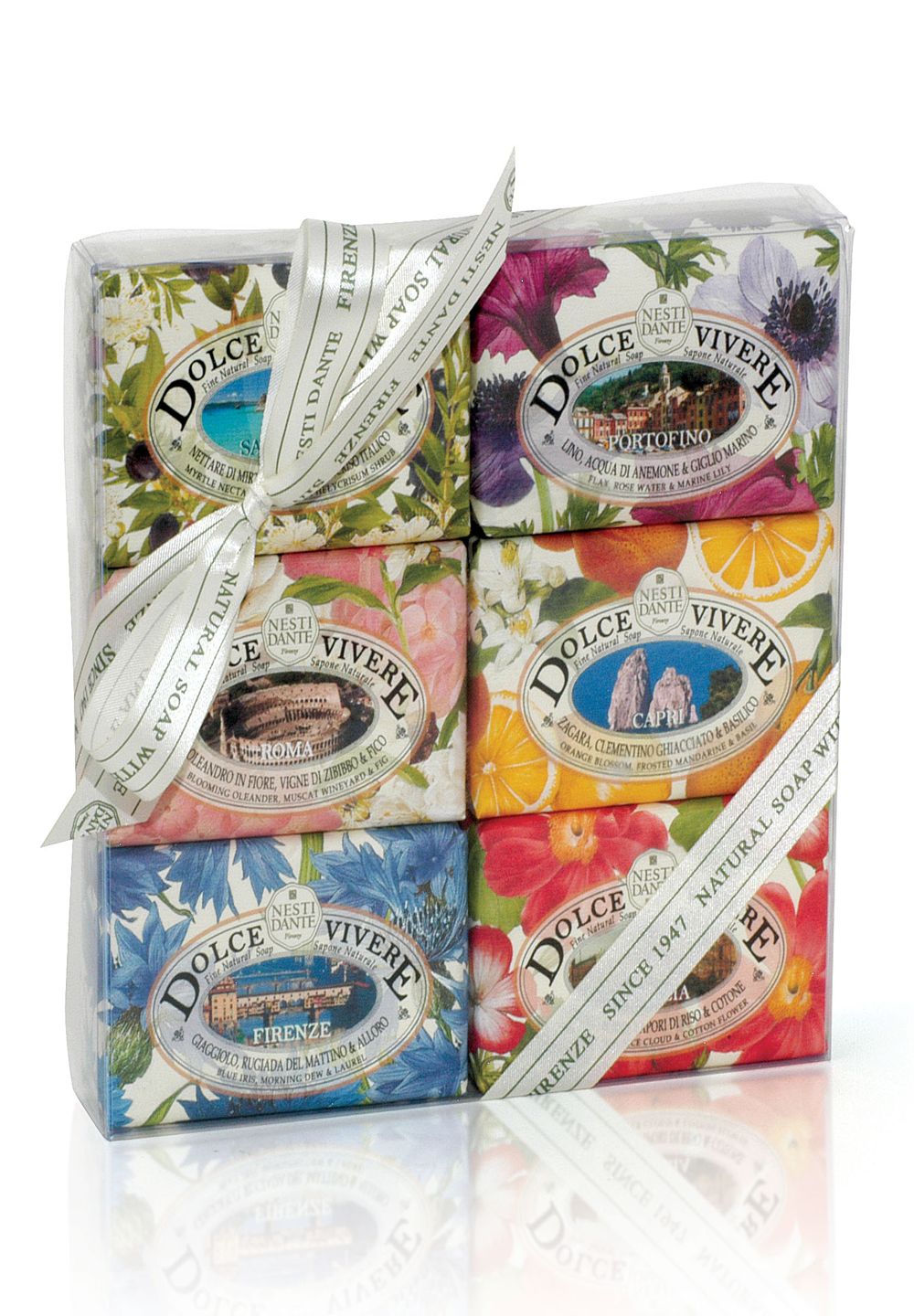 Nesti Dante Dolce Vivere Geschenkset mit sechs Seifen, Nahaufnahme der floralen und städtischen Verpackungen.