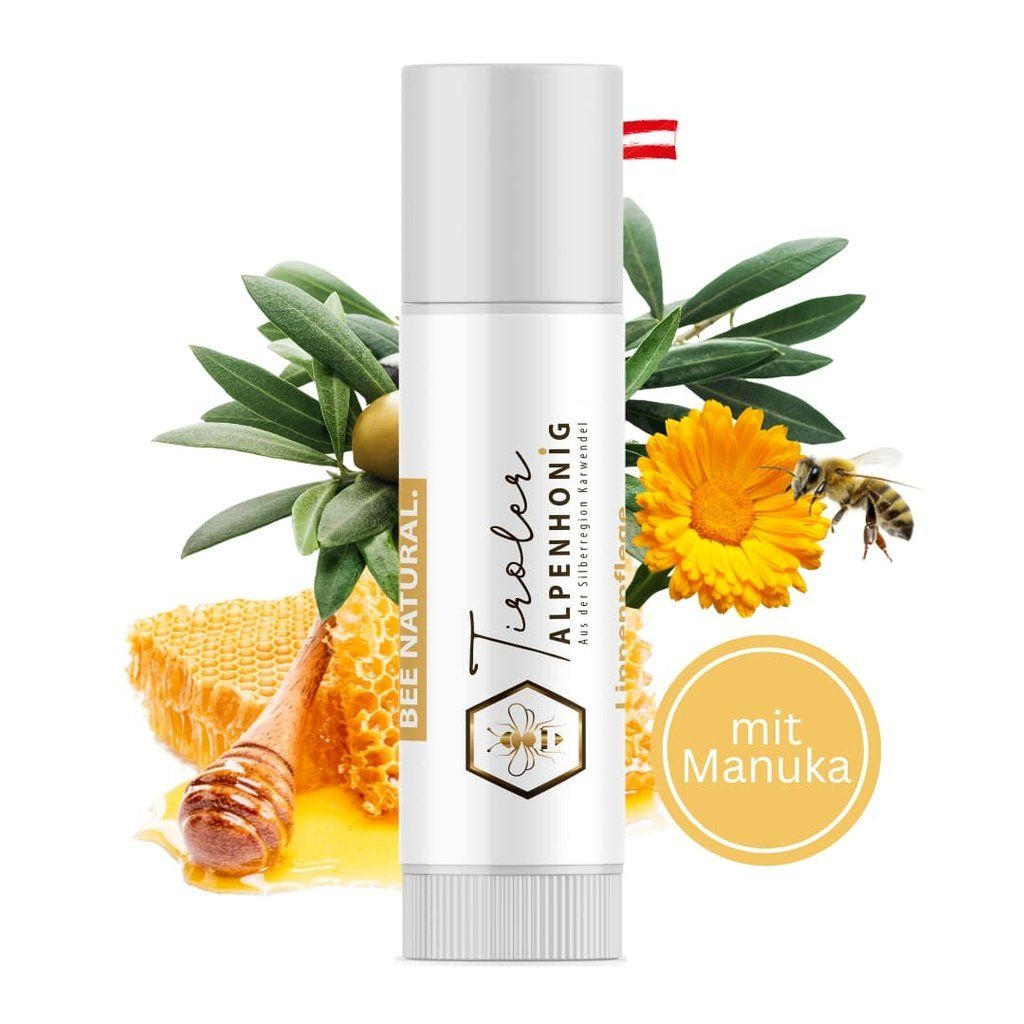 Lippenpflege-Stift mit Honigwabe, Olivenzweig, Ringelblume und Biene. Aufschrift: Tiroler Alpenhonig, mit Manuka.
