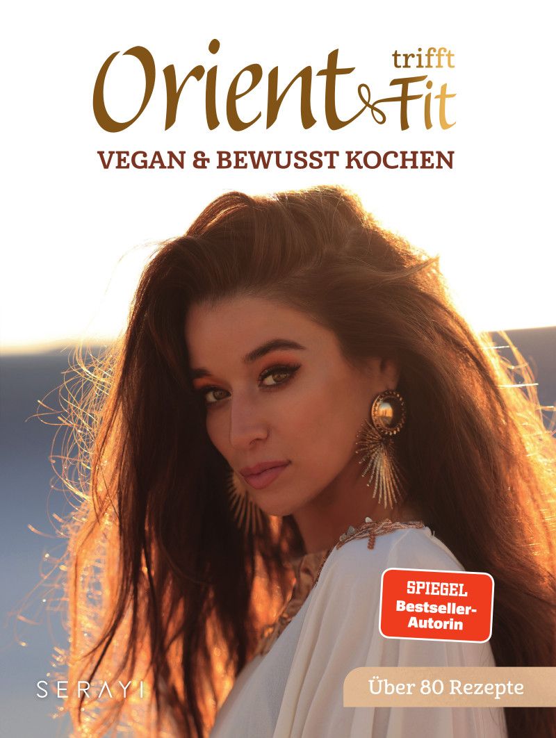 Buchcover mit Titel "Orient trifft Fit". Frau mit langen Haaren, goldfarbenem Schmuck. Aufkleber: Spiegel Bestseller-Autorin. Über 80 Rezepte.