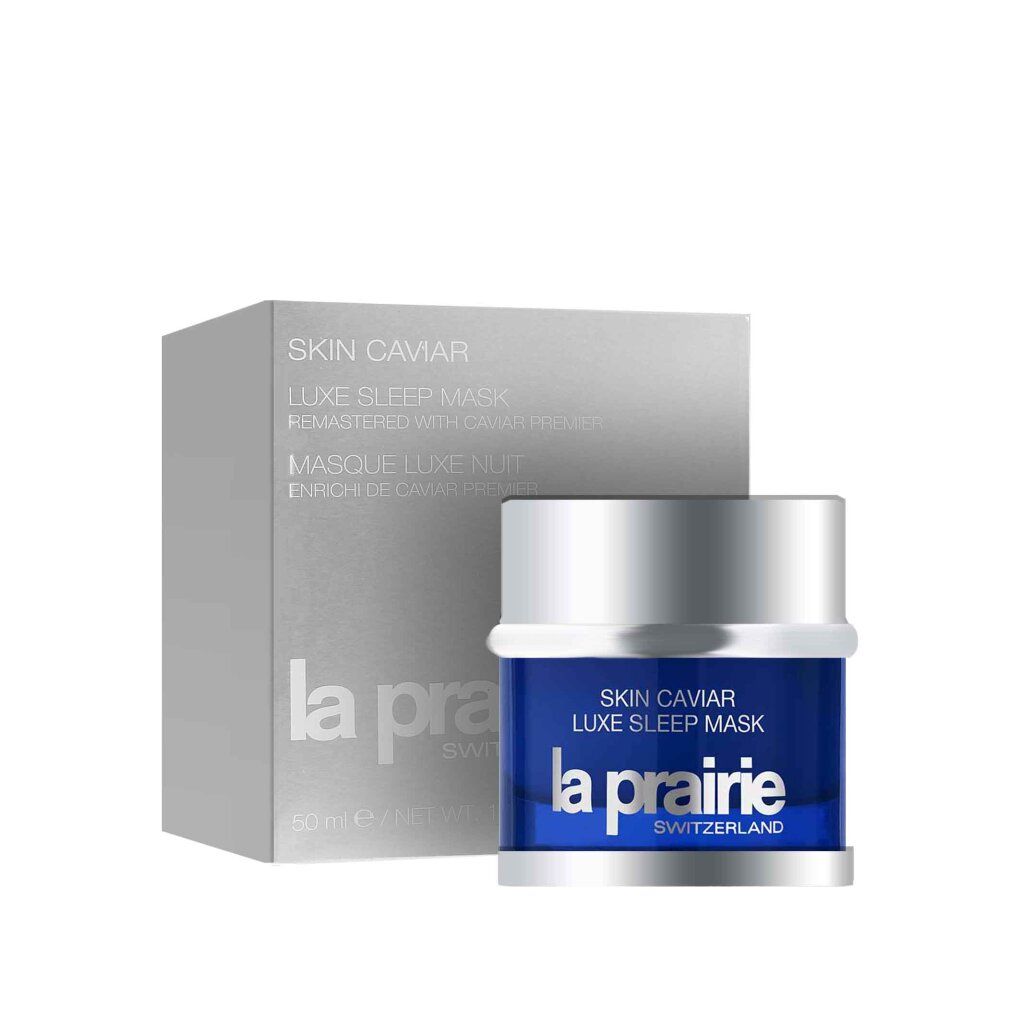 Blauer Tiegel mit silbernem Deckel und silberne Schachtel. Aufschrift: Skin Caviar, La Prairie. Produktinformationen.