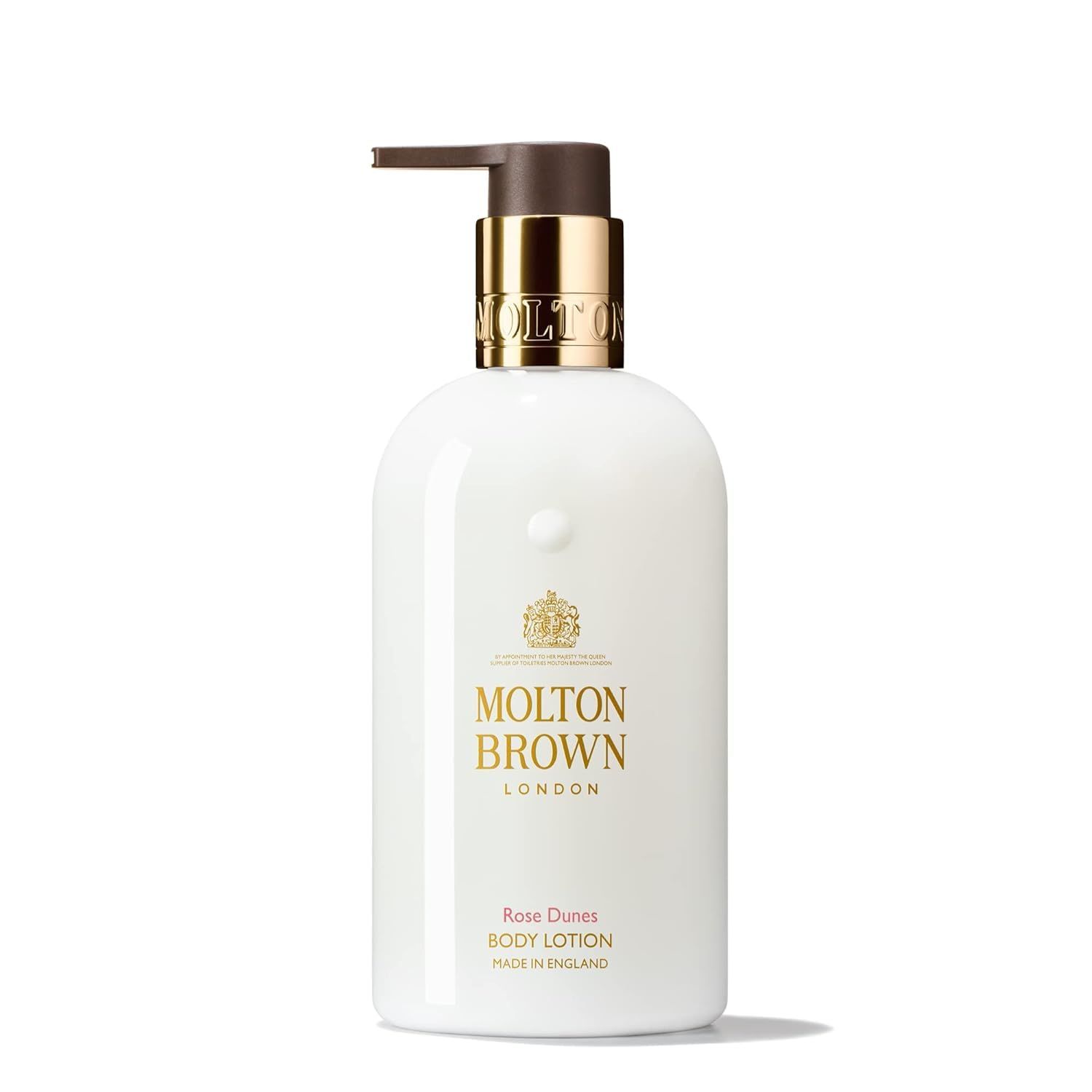 Weiße Körperlotion-Flasche mit Pumpe. Goldfarbener Pumpenkopf. Aufschrift: Molton Brown, Rose Dunes Body Lotion.