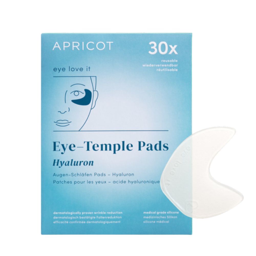 Blau-weiße Verpackung mit Produktname APRICOT, Eye-Temple Pads, Hyaluron. Eine transparente Augen-Schläfen Pad liegt daneben.