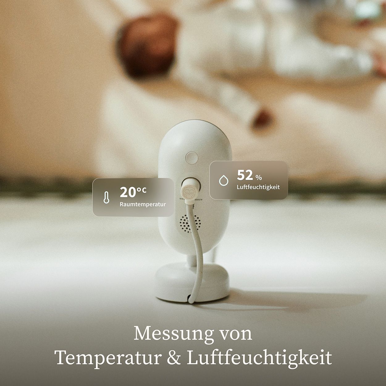 Babyphone-Kamera mit weißer Basis. Temperatur- und Feuchtigkeitsanzeige. Kabelanschluss.