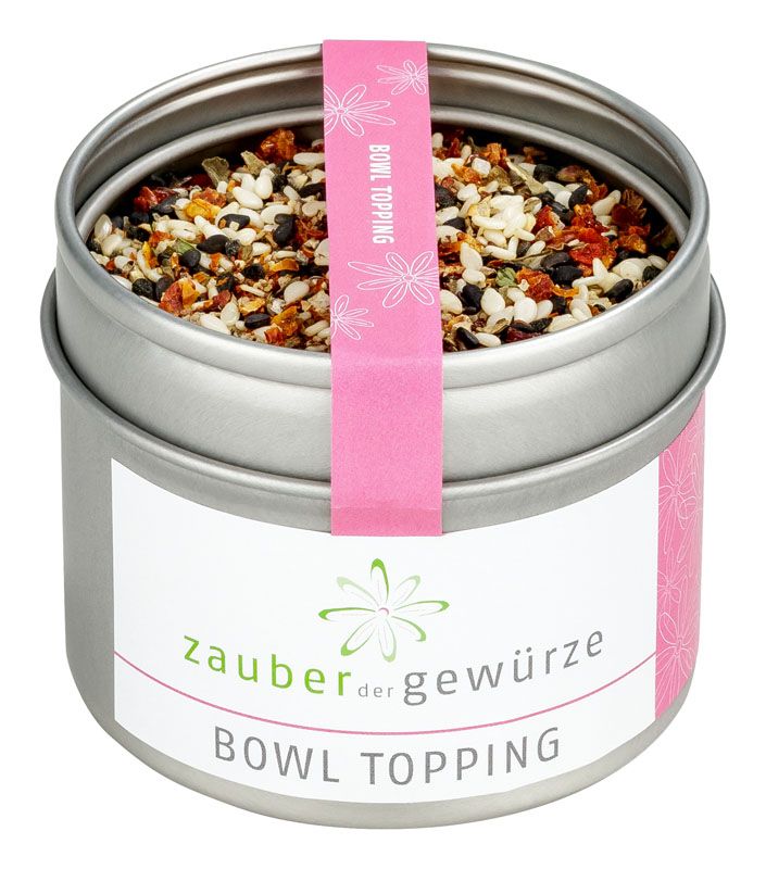 Runde Dose mit Zauber der Gewürze Bowl Topping. Rosa Band mit Aufschrift. Deckel mit Gewürzmischung gefüllt.