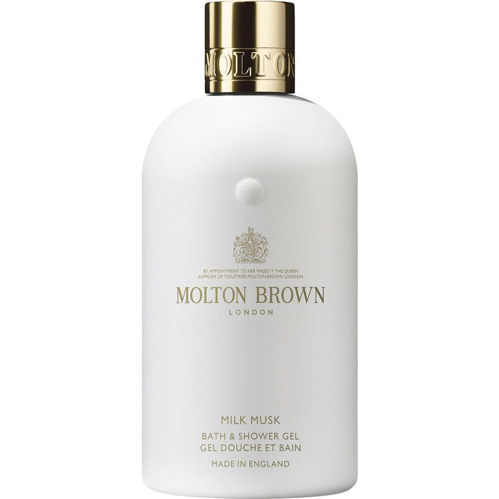 Weiße Molton Brown Flasche mit goldenem Verschluss, Milk Musk Bade- und Duschgel.