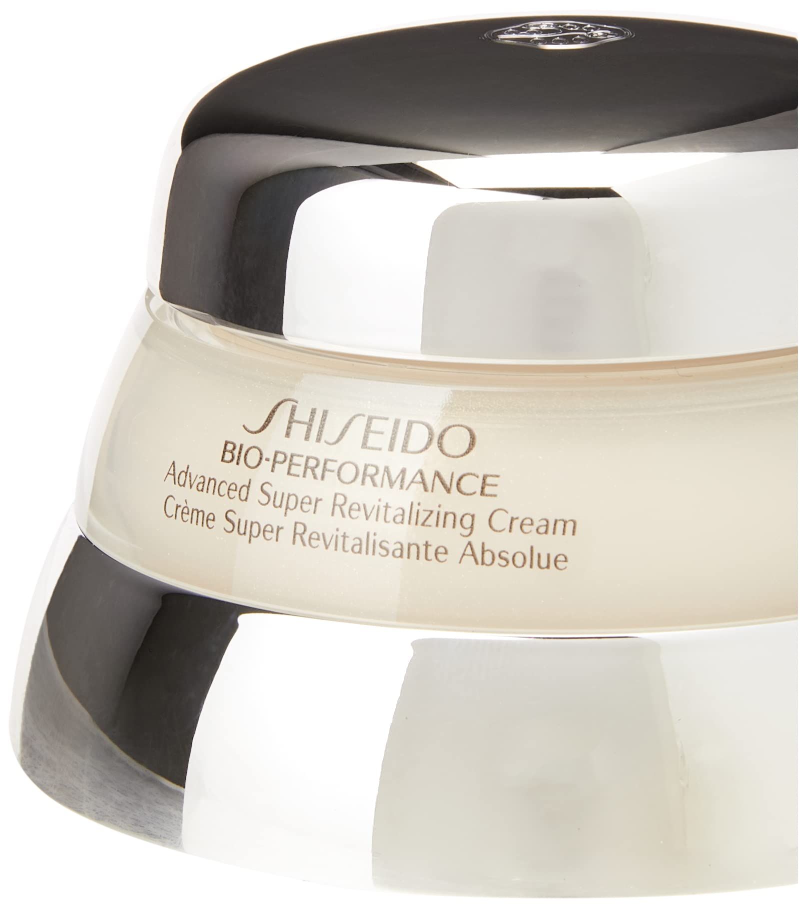 Creme-Dose mit silbernem Rand und weißem Deckel. Aufschrift: SHISEIDO BIO-PERFORMANCE Advanced Super Revitalizing Cream. Nahaufnahme.