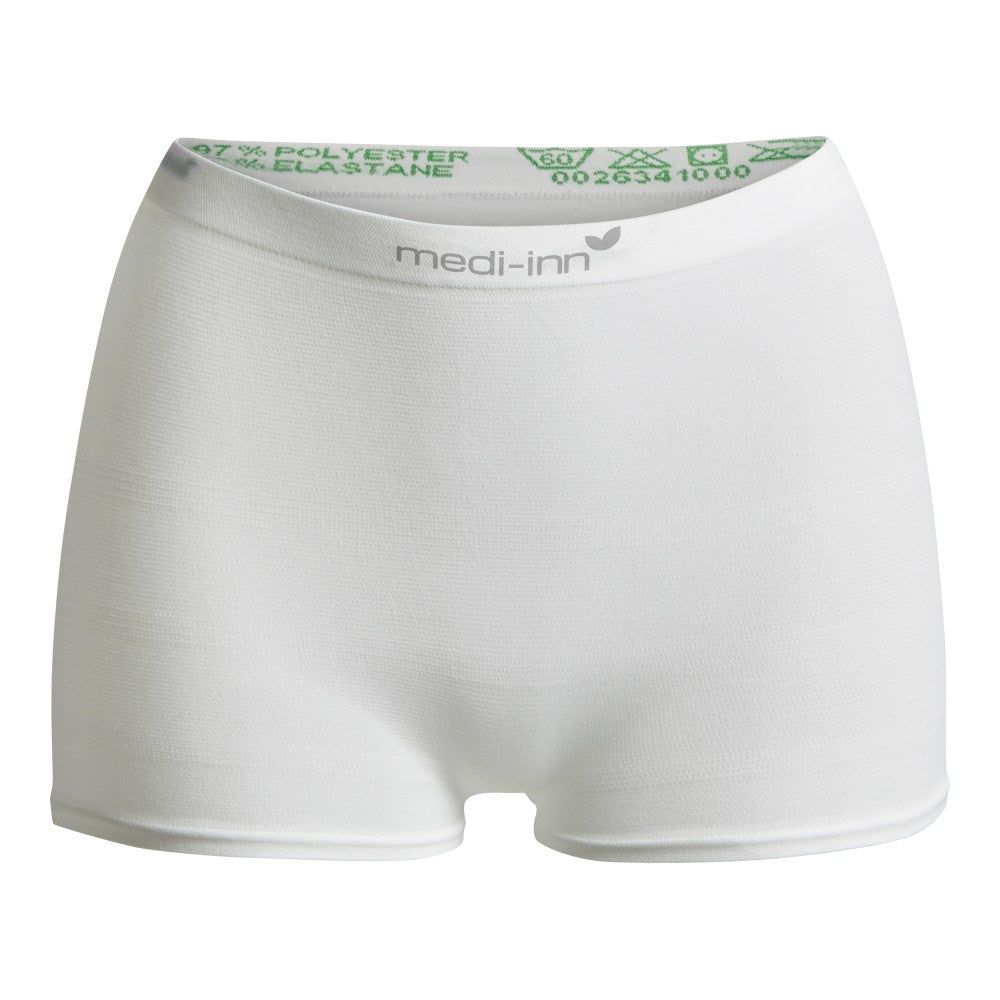 Weiße Fixierhose mit medi-inn Logo. Elastischer Bund mit Text. Unisex-Passform. Latexfrei.