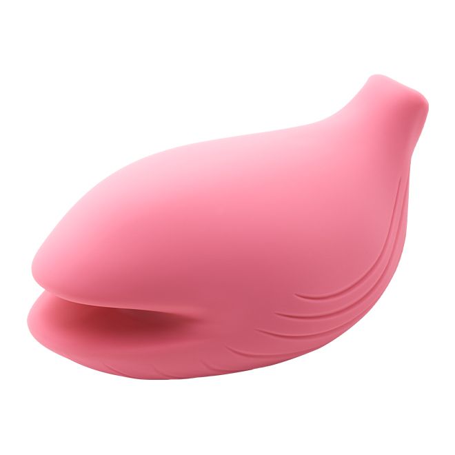 Rosa Vibrator in organischer Form. Mit geriffelter Oberfläche und einer Öffnung. Auf weißem Hintergrund.