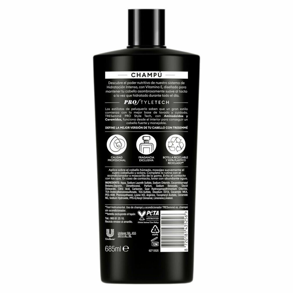Rückseite einer schwarzen Shampoo-Flasche. Text: Champú, Informationen zur Inhaltsstoffe, Recycling-Logo, PETA-Logo, 685ml.
