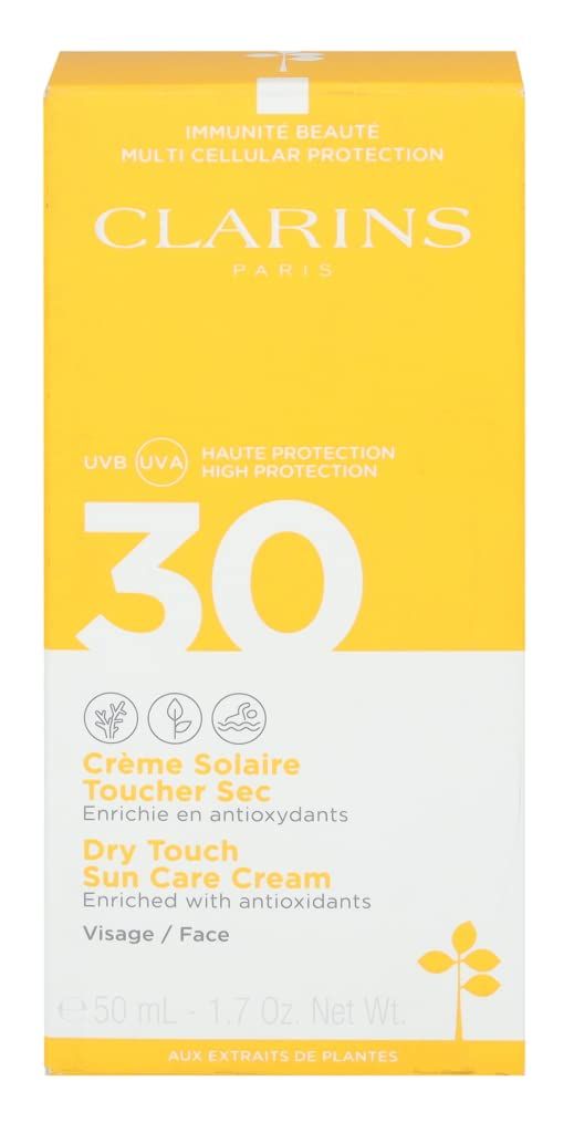 Clarins Crème Solaire Visage UVA/UVB 30. Gelbe Schachtel mit weißem Boden. Text: 30, Crème Solaire, Dry Touch, Visage/Face, 50 ml.