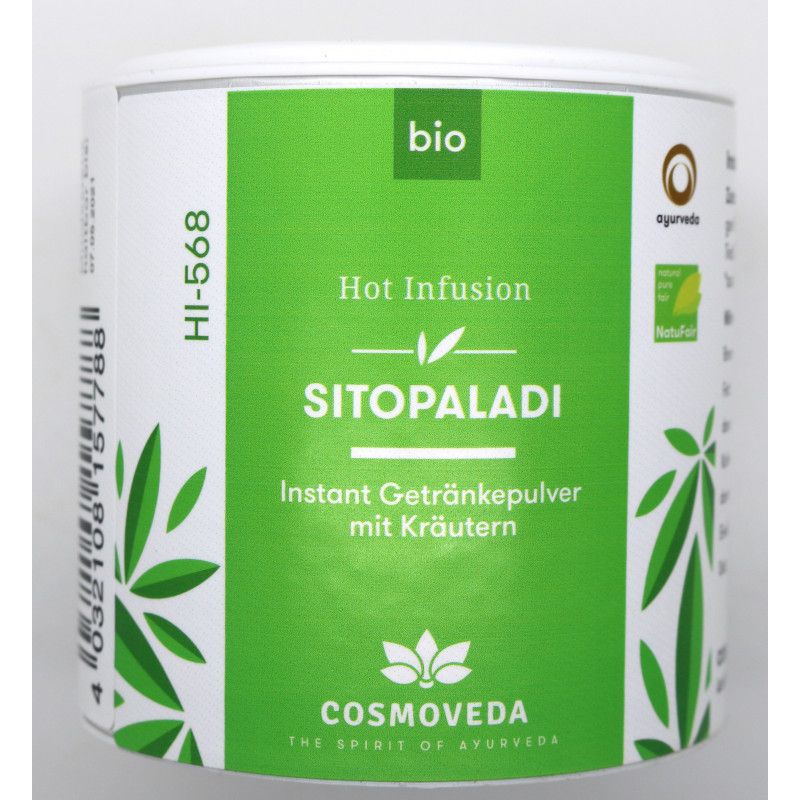Zylindrische Dose mit grünem Etikett. Aufschrift: Sitopaladi, Hot Infusion, Cosmoveda. Bio-Siegel, Ayurveda-Logo.