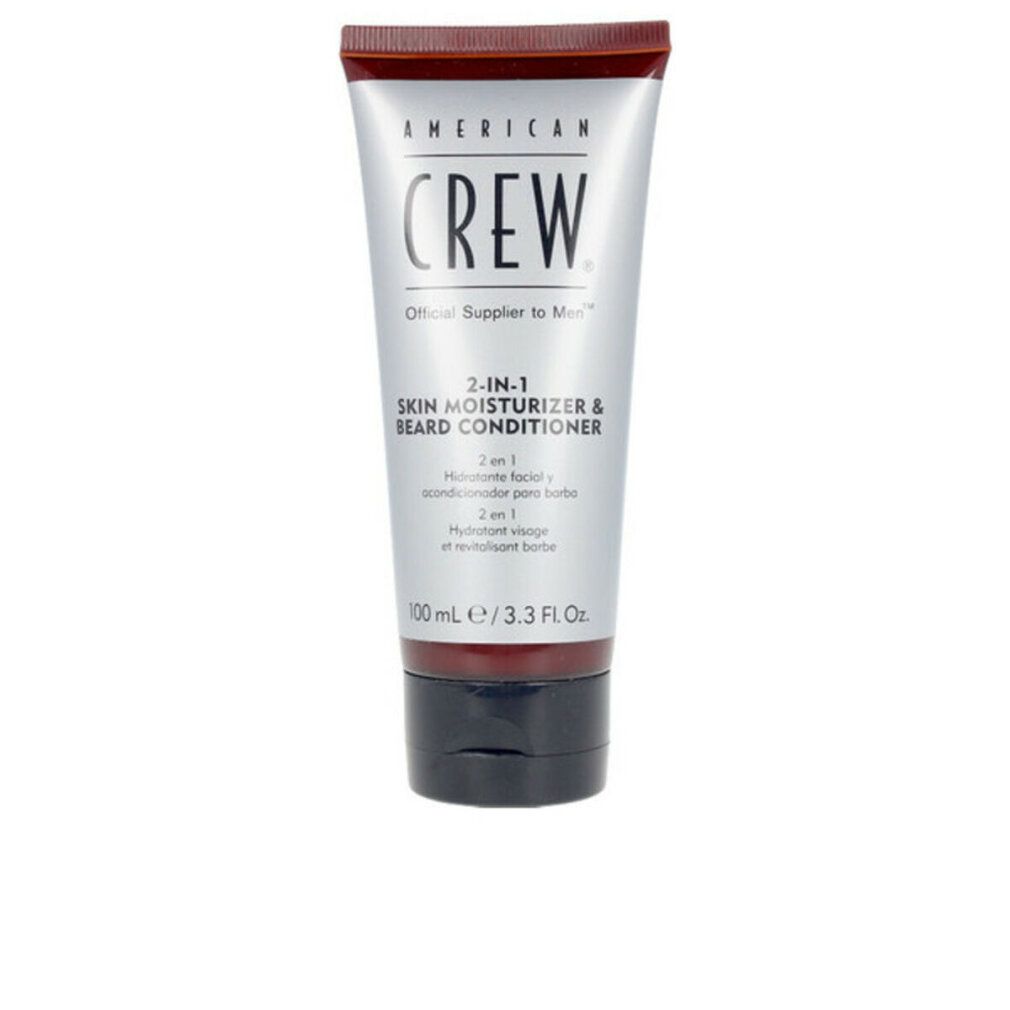 Creme-Tube mit Aufschrift AMERICAN CREW. 2-in-1 Skin Moisturizer & Beard Conditioner. Schwarzer Deckel, brauner Streifen.